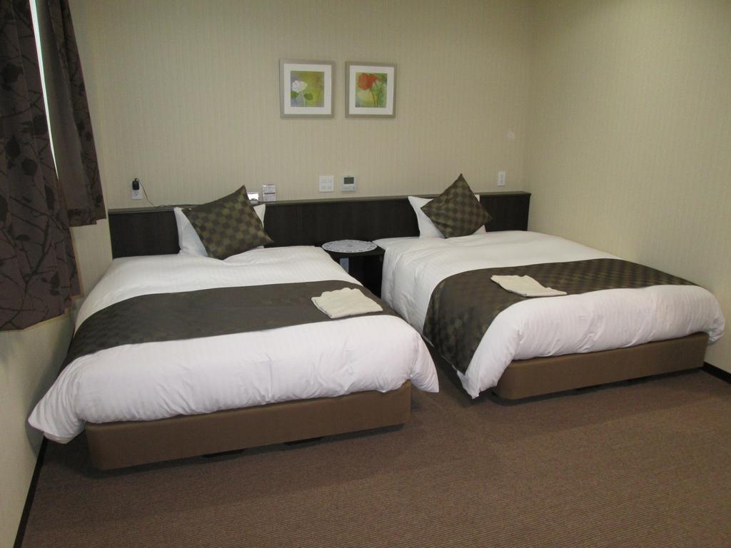 Okawa Riverside Hotel Bagian luar foto