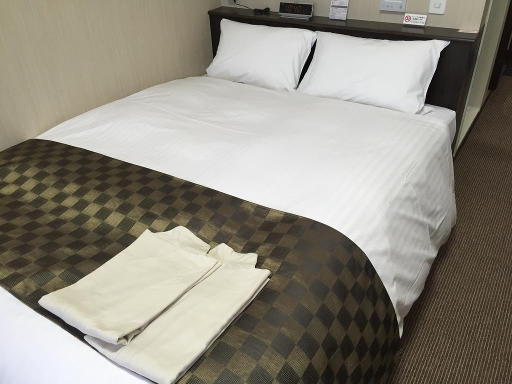 Okawa Riverside Hotel Bagian luar foto