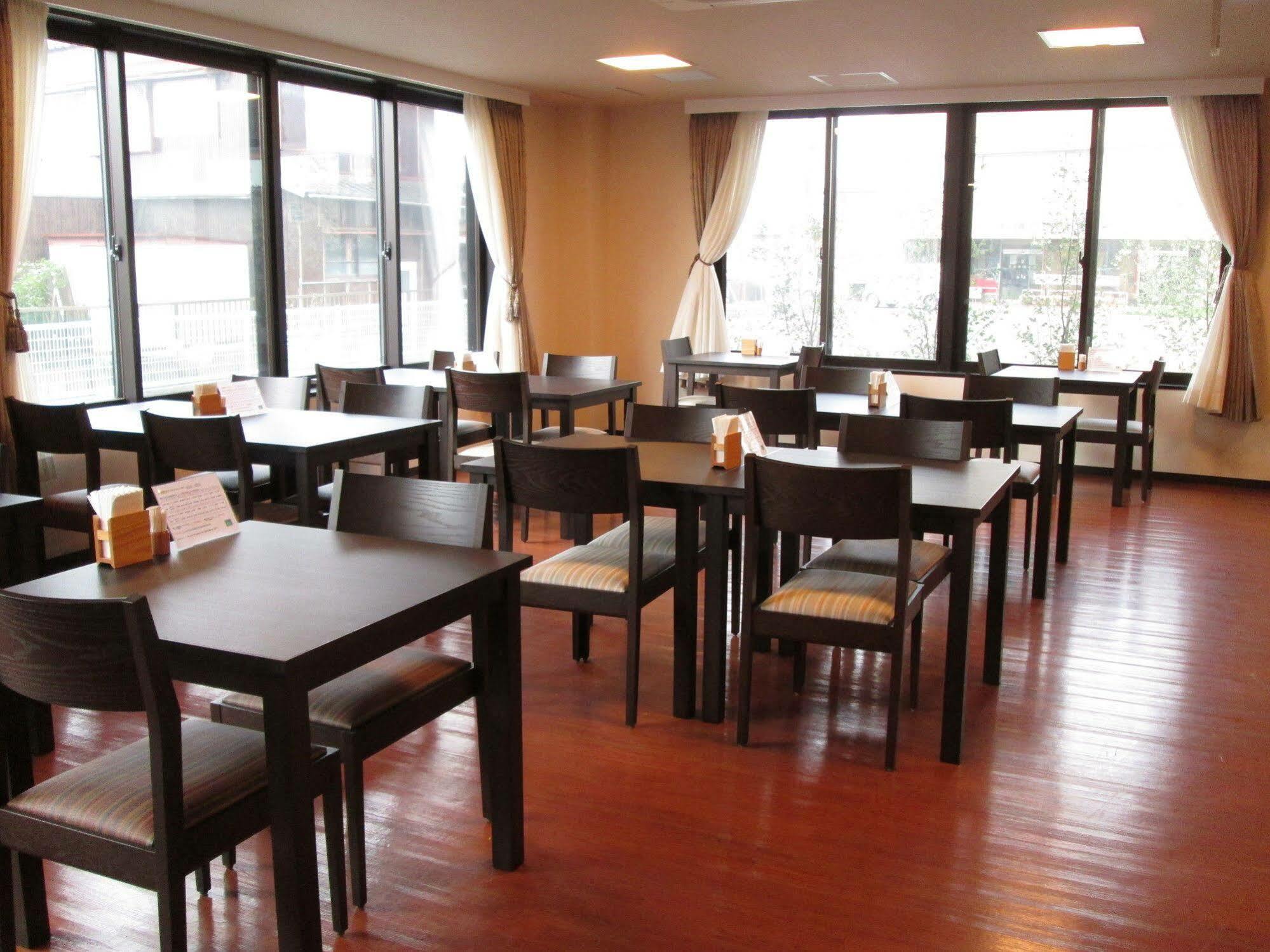 Okawa Riverside Hotel Bagian luar foto